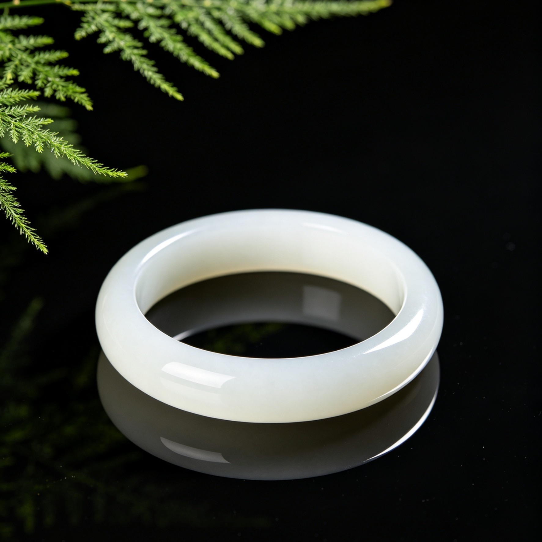 Hetian white jade bracelet guards happiness and peace, a protective charm.